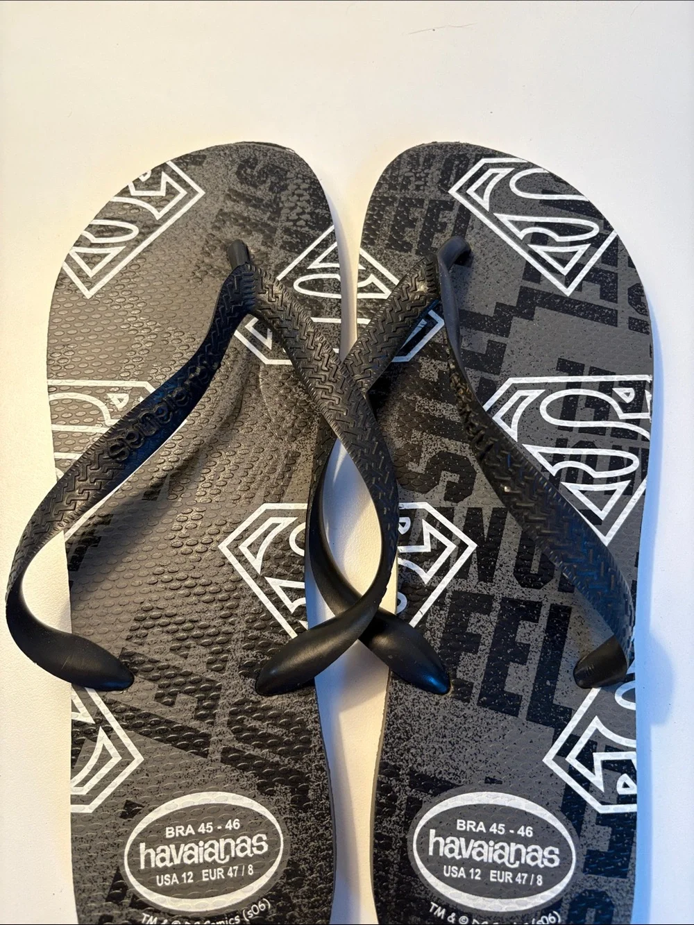 THREE pairs of men’s flip flops
